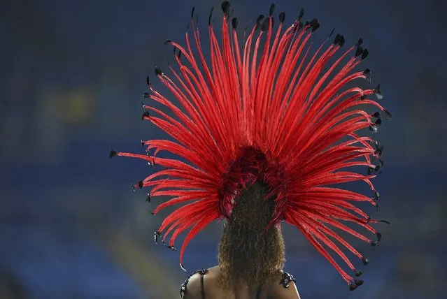 2016 Rio Olympics, Athletics, Dancers, Olympic Stadium, Rio de Janeiro, Brazil on August 20, 2016. A dancer waits to perform. (Photo by Dylan Martinez/Reuters)