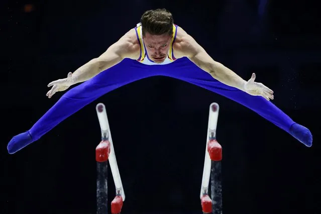 Romania's Gabriel Burtanete in action during the men's parallel bars qualification at the Artistic Gymnastics World Championships M&S Bank Arena, Liverpool, Britain on October 31, 2022. (Photo by Molly Darlington/Reuters)