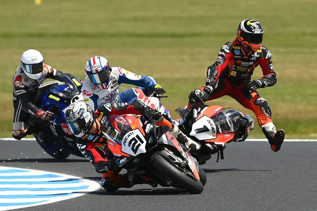 Wayne Maxwell of Australia crashes his #1 The Construction Team Ducati in Race 2 of the Australian Superbikes during the 2022 MOTUL FIM Superbike World Championship at Phillip Island Grand Prix Circuit on November 20, 2022 in Phillip Island, Australia. (Photo by Quinn Rooney/Getty Images)