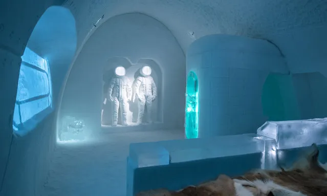 Two sculptures of astronauts feature in the Space Room, designed by Adrian Bois Pablo Lopez. As well as creating artworks from it, ice is used to make an ice bar and even the glasses used for drinks. (Photo by Asaf Kliger/IceHotel/The Guardian)