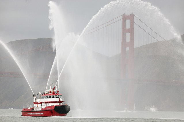 San Francisco Fire Department fire boat leads the way during a parade for yachting season opening day ceremonies at St. Francis Yacht Club in San Francisco, Sunday, April 27, 2025. (Photo by Scott Strazzante/San Francisco Chronicle via AP Photo)