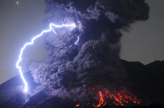 A dirty thunderstorm occurs over Mount Sakurajima as the volcano erupts violently at 12:03 am on July 26, 2016 in Tarumizu, Kagoshima, Japan. The eruption occurred at the mountain's Showa crater. This is the first time that the active volcano in southern Kyushu has spewed out a smokestack that high since an eruption on August 18, 2013, according to the Kagoshima Meteorological Office. (Photo by The Asahi Shimbun via Getty Images)