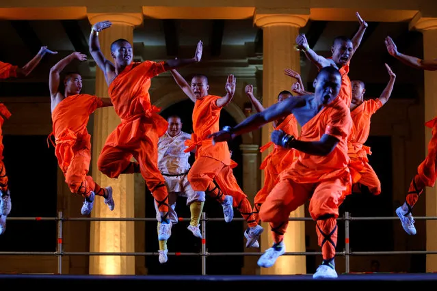 Shaolin monks of the Dengfeng Zhongyue Shaolin Boxing Culture Troupe from Henan Province in China perform in Valletta, Malta, September 17, 2016. (Photo by Darrin Zammit Lupi/Reuters)