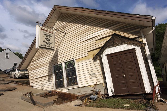 The Valley Grove Assembly of God, twisted and moved from its foundation by floodwaters, is seen Monday, June 16, 2025, in Valley Grove, W.Va. (Photo by Carolyn Kaster/AP Photo)