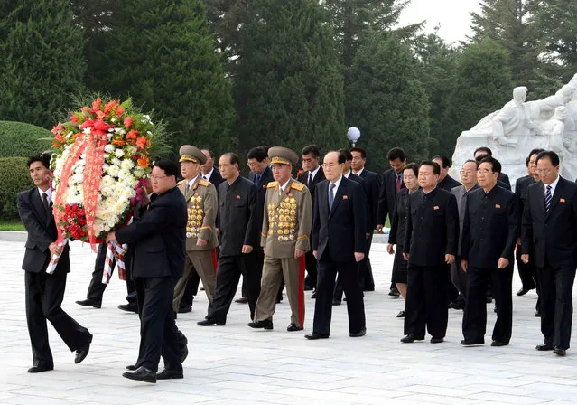 Wreaths were laid before the Revolutionary Martyrs Cemetery on Mt. Taesong, the Patriotic Martyrs Cemetery in Sinmi-ri and the Fatherland Liberation War Martyrs Cemetery on Friday, the 68th founding anniversary of the DPRK. in this photo released by North Korea's Korean Central News Agency (KCNA) September 9, 2016. (Photo by Reuters/KCNA)