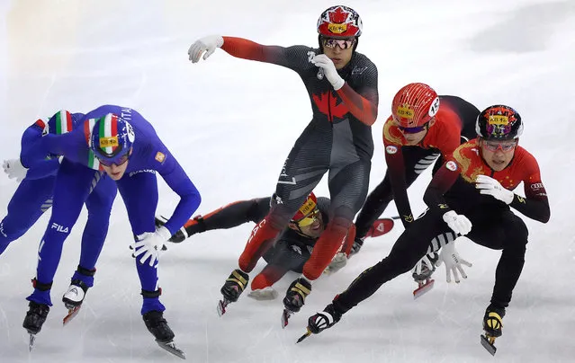 Canada's Maxime Laoun falls during the men's 5000m relay final at the ISU Short Track Speed Skating Championships in Seoul, South Korea on March 12, 2023. (Photo by Kim Hong-Ji/Reuters)