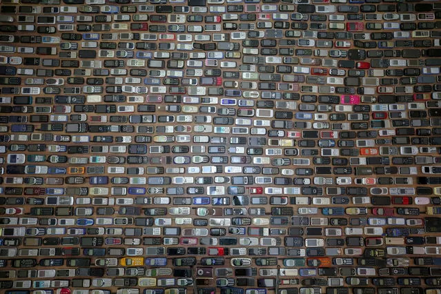 Phone repairman Sehabettin Ozcelik, collecting mobile phones over 20 years, now owns a thousand of them, displays his collection in his house in Van, Turkey on October 20, 2020. (Photo by Ozkan Bilgin/Anadolu Agency via Getty Images)