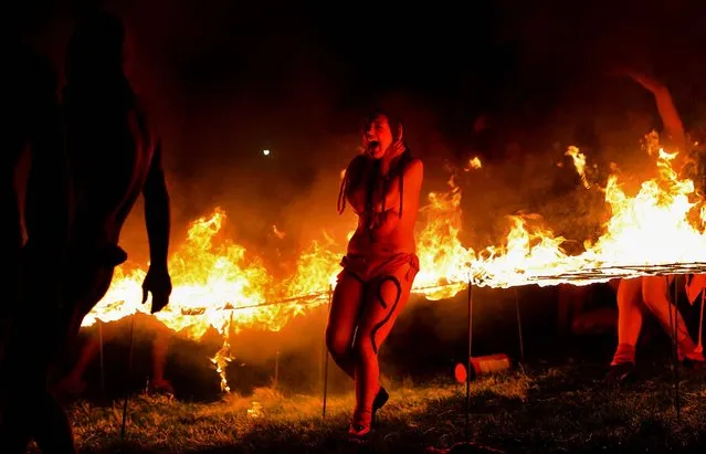 Beltane Fire Society performers celebrate the coming of summer during the Beltane Fire Festival on Calton Hill in Edinburgh, Scotland, on April 30, 2013. (Photo by Jeff J. Mitchell/Getty Images)