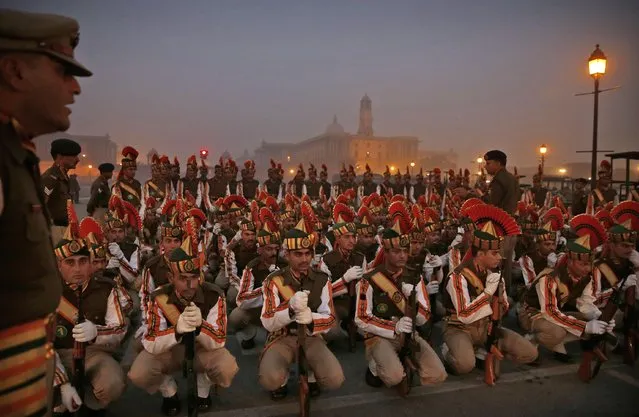 Indian paramilitary soldiers rehearse for the upcoming Republic Day parade in New Delhi, India, Thursday, January 14, 2015. (Photo by Manish Swarup/AP Photo)