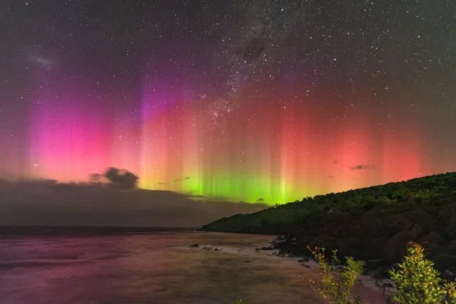 The Southern Lights photographed near Stirling Point, New Zealand on April 24, 2023. (Photo by Rita Baker/The Guardian)