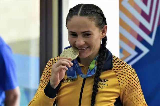 Gold medal winner Yeni Arias of Colombia poses with her medal after the women's 57kg boxing final of the Central American and Caribbean Games in San Salvador, El Salvador, Wednesday, June 28, 2023. (Photo by Arnulfo Franco/AP Photo)