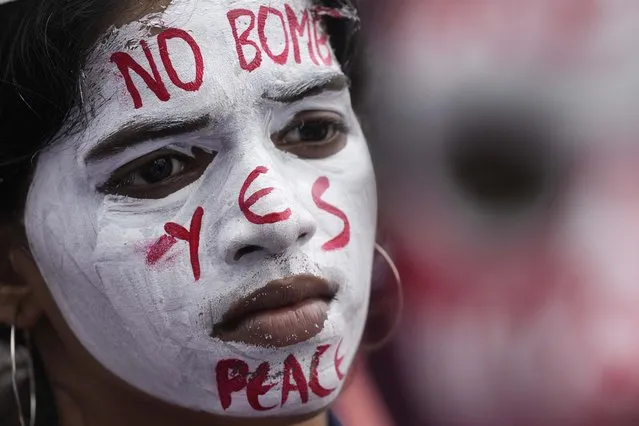 A student participates in a peace rally to mark the anniversary of World War II atomic bombing of Hiroshima and Nagasaki, in Mumbai, India, Saturday, August 5, 2023. (Photo by Rajanish Kakade/AP Photo)