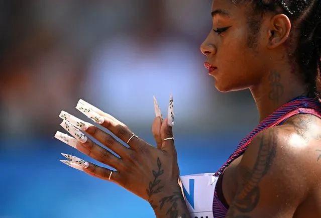 Sha'carri Richardson of the U.S. readies herself for the start of heat 2 in the women's 200m at the World Athletics Championship at the National Athletics Centre, Budapest, Hungary on August 23, 2023. (Photo by Dylan Martinez/Reuters)