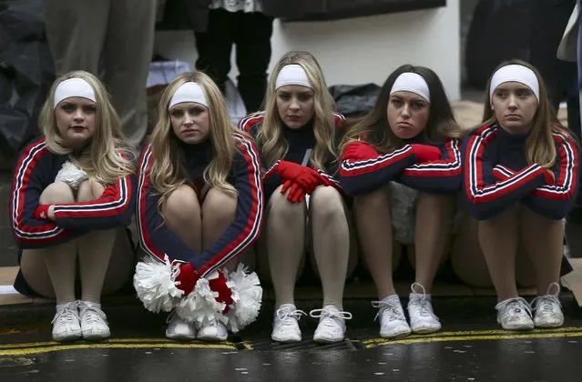 Cheerleaders wait to perform before the New Year's Day parade in London, Britain January 1, 2017. (Photo by Neil Hall/Reuters)
