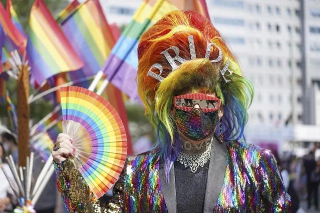 Jerome Champagne takes part in the Christopher Street Day (CSD) parade, in Berlin, Saturday, July 24, 2021. The official motto of the CSD is “Save our Community – save our Pride”.  (Photo by J'rg Carstensen/dpa via AP Photo)