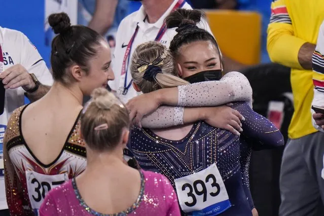 Sunisa Lee of Team United States hugs Jade Carey of Team United States after the artistic gymnastics women's all-around final during the Tokyo 2020 Olympic Games at the Ariake Gymnastics Centre in Tokyo on July 29, 2021. (Photo by Toni L. Sandys/The Washington Post)