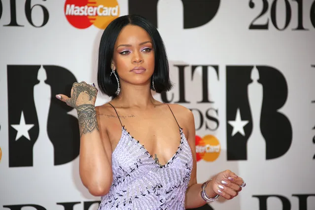Singer Rihanna poses for photographers upon arrival for the Brit Awards 2016 at the 02 Arena in London, Wednesday, February 24, 2016. (Photo by Joel Ryan/Invision/AP Photo)