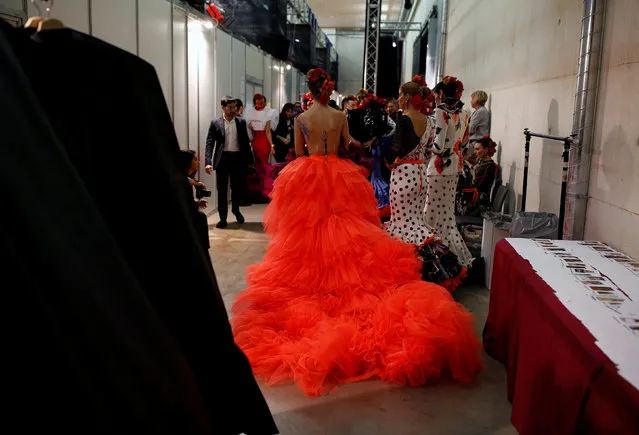 Models are seen backstage as they wear creations by Veronica de la Vega during the International Flamenco Fashion Show SIMOF in the Andalusian capital of Seville, Spain February 8, 2019. (Photo by Marcelo del Pozo/Reuters)