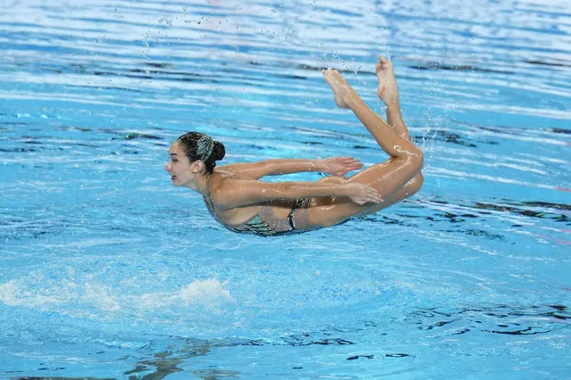 Theodora Garrido and Nicolas Campos, of Chile, compete in the mixed duet technical of artistic swimming at the World Aquatics Championships in Doha, Qatar, Saturday, February 3, 2024. (Photo by Lee Jin-man/AP Photo)