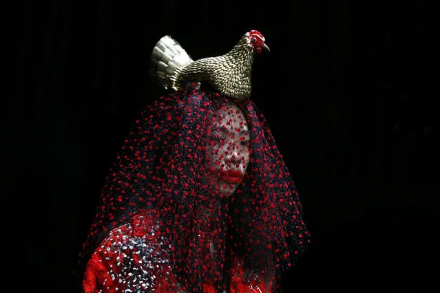 A model presents a creation by designer writtenafterwards during the Autumn/Winter 2016 Tokyo Fashion Week in Tokyo, Japan, March 16, 2016. (Photo by Thomas Peter/Reuters)