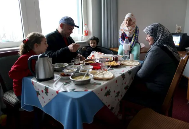 A Syrian family eats at their room at the accommodation for migrants “Spree Hotel” in Bautzen, Germany, March 22, 2016. (Photo by Ina Fassbender/Reuters)