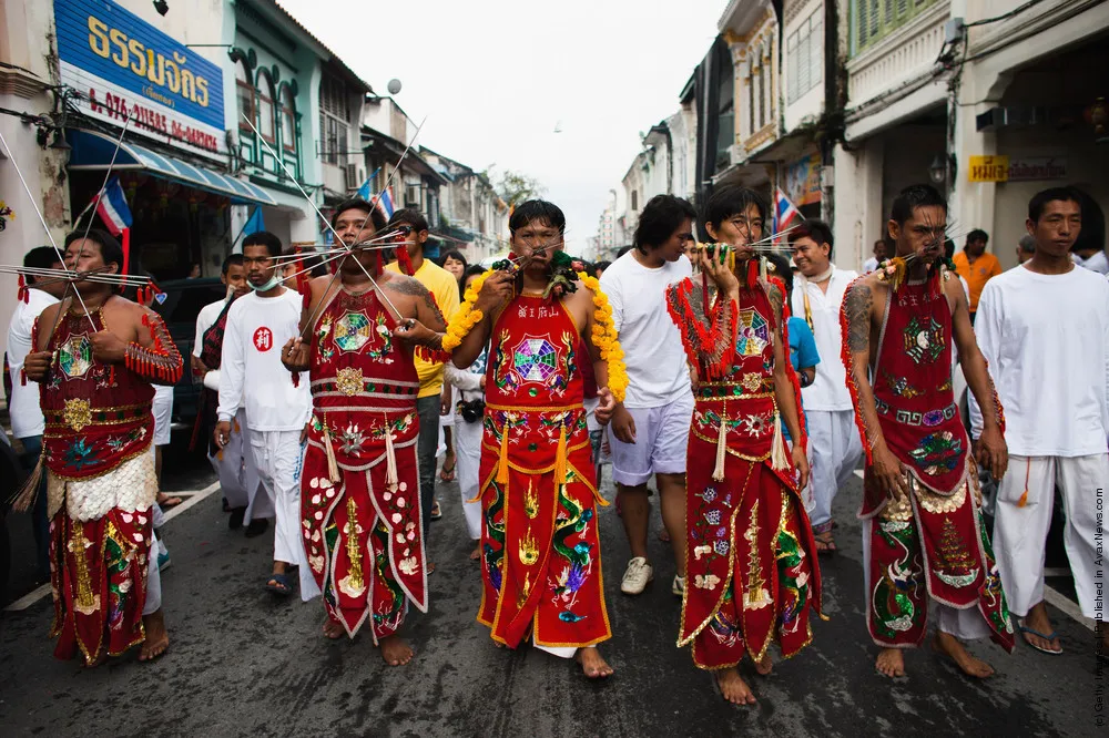 Devotees Practice Self Mutilation At Phuket Vegetarian Festival