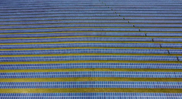 A field of solar panels is seen near Royston, Britain, April 26, 2021. (Photo by Matthew Childs/Reuters)