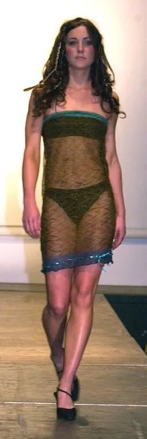 Kate Middleton on the catwalk wearing a sheer black lace dress over a bandeau bra and black bikini bottoms at a student fashion show attended by Prince William, on March, 26, 2002 in St.Andrews, Scotland. (Photo by Malcolm Clarke/Daily Mail/Rex Features/Shutterstock)