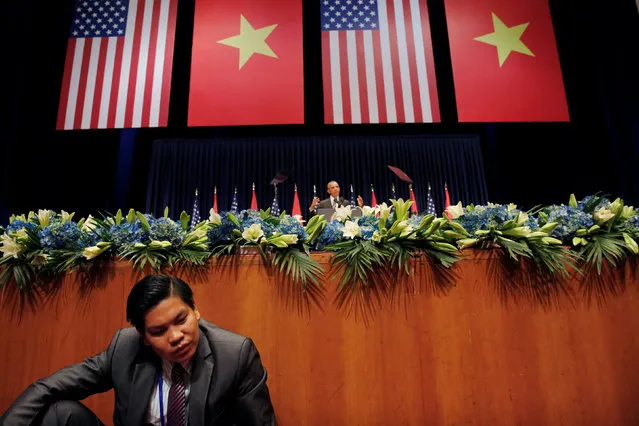 A member of the Vietnamese security personnel  listens as U.S. President Barack Obama delivers a speech at the National Convention Center in Hanoi, Vietnam May 24, 2016. (Photo by Carlos Barria/Reuters)