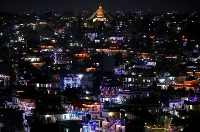 A general view shows houses decorated with lanterns and lights during the Tihar festival, also called Diwali, the Hindu festival of lights in Kathmandu, Nepal on October 26, 2019. (Photo by Navesh Chitrakar/Reuters)