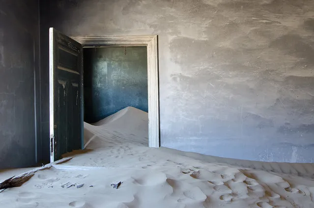 “Kolmanskop Interior #6641”. This image, is one of many of this buildings interior that I photographed. It was so interesting to see the way the sand dunes reclaimed the area over the years. Hard to believe that it was someone's home in 1954. This is just one building in the abandoned area of a diamond mine called Kolmanskop, in Namibia. I spent the entire day here getting better and better at visualizing how to shot these amazing interiors. Photo location: Kolmanskop Diamond Mine, Namibia. (Photo and caption by Bonnie Flamer/National Geographic Photo Contest)