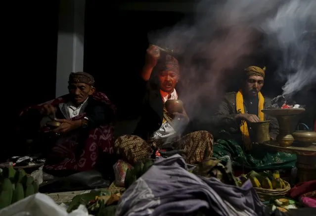 Tenggerese shamans pray during the Kasada Festival at Mount Bromo in Probolinggo, Indonesia's East Java province, August 1, 2015. (Photo by Reuters/Beawiharta)