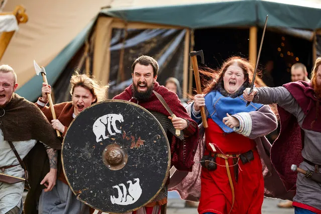 Viking re-enactors representing the rival armies of the Vikings and Anglo-Saxons skirmish near Clifford’s Tower during the Jorvik Viking Festival on February 23, 2019 in York, England. (Photo by Christopher Thomond/The Guardian)