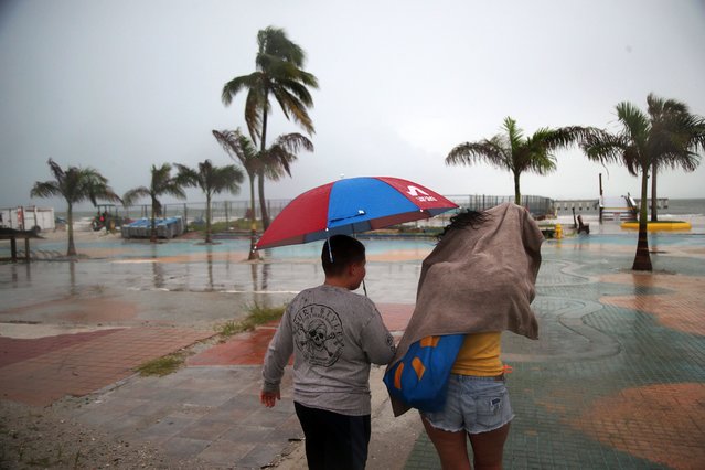 The outer portions of a tropical system saturates Fort Myers Beach on Saturday, August 3, 2024. The system is expected to turn into Tropical Storm Debby once it starts heading north into the Gulf of Mexico. The center of the storm is expected to stay offshore, however SWFL will see effects from it. (Photo by Andrew West/The News-Press via USA TODAY Network)