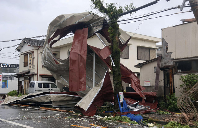 An object blown by strong winds caused by Typhoon Shanshan is stranded on a power line in Miyazaki, southwestern Japan, on August 29, 2024, in this photo taken by Kyodo News. (Photo by Kyodo via Reuters)