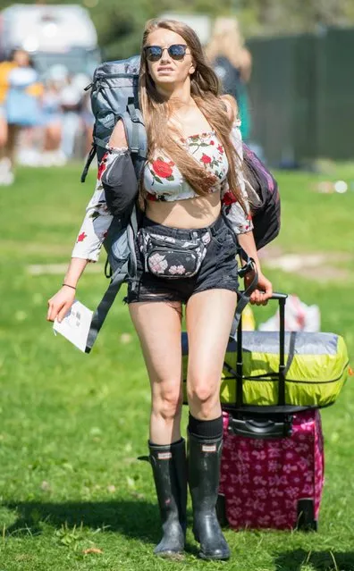 Festival goers arrive at V Festival, Weston Park, Staffordshire, England on August 18, 2017. (Photo by SWNS:South West News Service)