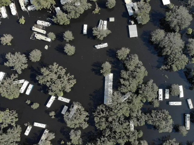 A flooded trailer park is seen after Hurricane Ian caused widespread destruction in Arcadia, Florida, U.S., October 4, 2022. (Photo by Marco Bello/Reuters)
