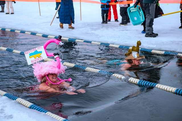 Swimmers take part in the 25 meter hat competition swim during the Memphremagog Winter Swimming Festival at lake Memphremagog in Newport, Vermont on February 21, 2025. (Photo by Joseph Prezioso/AFP Photo)