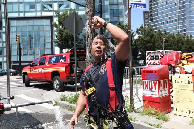 FDNY respond to an unstable building (white) at 45-18 Court Square West in Long Island City, NY on July 13, 2020. (Photo by James Messerschmidt/The New York Post)