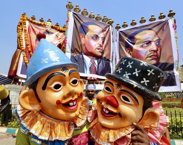 Indian folk artists attend the celebrations for the 134th birth anniversary of Bhimrao Ramji Ambedkar in front of Vidhana Soudha, the seat of the Karnataka Legislature Assembly, in Bangalore, India, 14 April 2025. India's first Law Minister, social reformer, and chairman of the Constitution Drafting Committee, B. R. Ambedkar, drafted the nation's constitution and campaigned against discrimination of Dalits, caste discrimination, and “untouchability”. (Photo by Jagadeesh N.V./EPA)