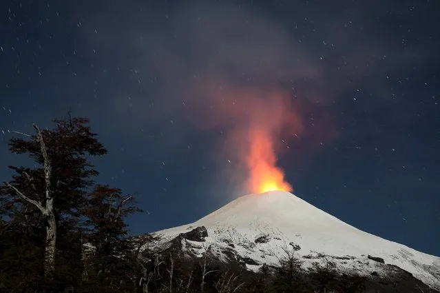 The Villarrica Volcano is seen at night in Chile, April 17, 2016. Villarrica is one of Chile's most active volcanoe. (Photo by Cristobal Saavedra/Reuters)