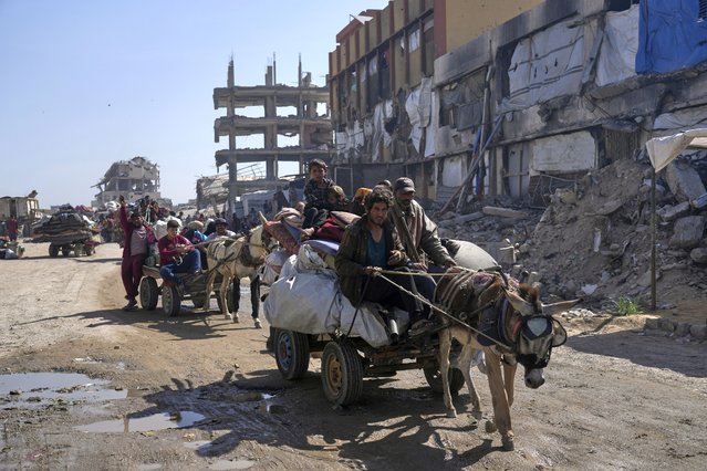Displaced Palestinians fleeing Beit Lahia amid ongoing Israeli military operations in the Gaza Strip arrive in Jabalia, northern Gaza, on Friday, May 16, 2025. (Photo by Jehad Alshrafi/AP Photo)
