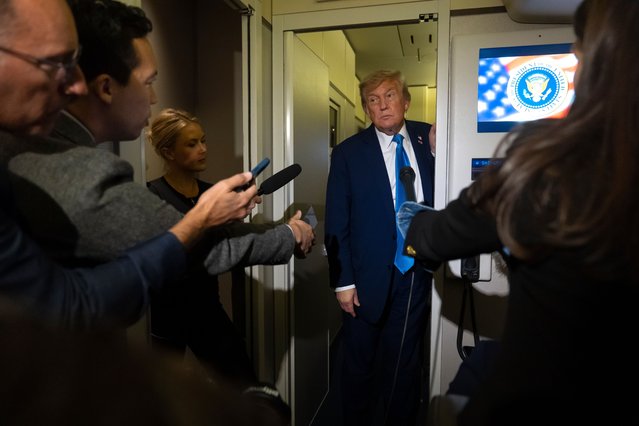 President Donald Trump speaks with reporters while flying aboard Air Force One en route from Calgary, Canada to Joint Base Andrews, Md., late Monday, June 16, 2025. (Photo by Mark Schiefelbein/AP Photo)