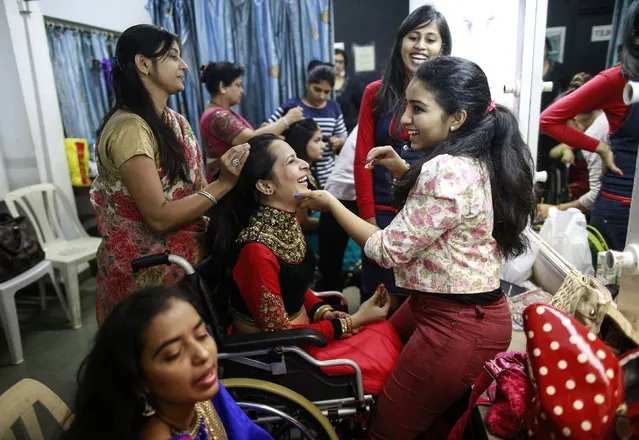 Competitors prepare backstage during the Miss Wheelchair India beauty pageant in Mumbai November 26, 2014. (Photo by Danish Siddiqui/Reuters)