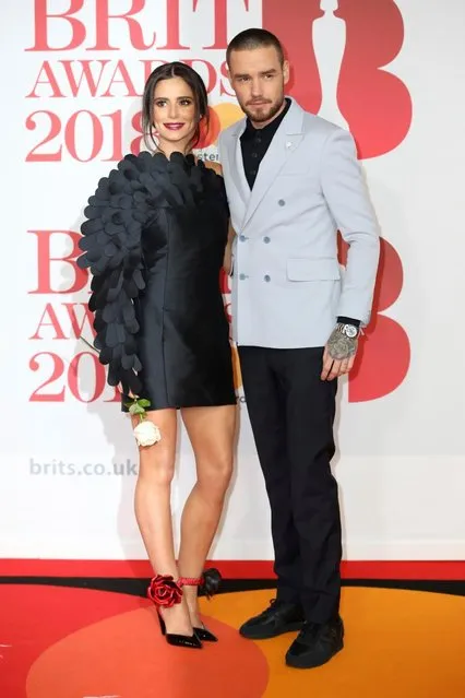 Singers Cheryl, left, and Liam Payne pose for photographers upon arrival at the Brit Awards 2018 in London, Wednesday, February 21, 2018. (Photo by Vianney Le Caer/Invision/AP Photo)