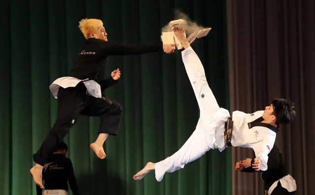 Members of South Korean taekwondo demonstration team perform at the Pyongyang Grand Theatre in Pyongyang, North Korea, 02 April 2018. A 120-member troupe of South Korean performers stages two performances in North Korea on 01 April and 03 April 2018, the first such event since 2005. (Photo by EPA/EFE/Stringer)