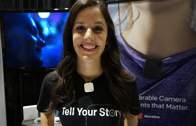 Corina Standiford of Narrative models the Narrative Clip wearable camera (white box on shirt) at the International Consumer Electronics show (CES) in Las Vegas, Nevada January 4, 2015. The device uses WiFi and Bluetooth to upload its stored photos. (Photo by Rick Wilking/Reuters)