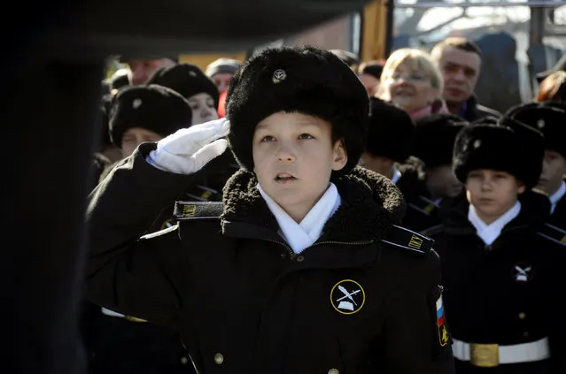 Young naval cadets take part in an oath-taking ceremony at the Vladivostok Presidential Cadet School in Vladivostok, Russia, October 29, 2016. (Photo by Yuri Maltsev/Reuters)