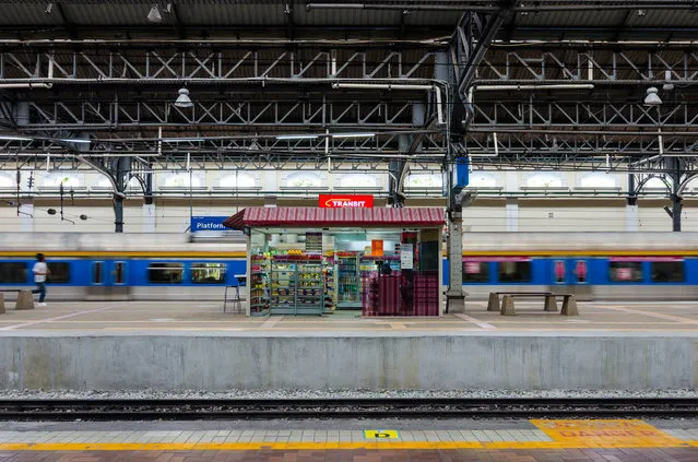 “A Store in Kuala Lumpur Railway Station”. I have once visit this historical railway station and shoot this scene with iphone, after several month I think that I should do it in high resolution and shoot it properly way. The parallel construction is what I concern. Location: Kuala Lumpur, Malaysia. (Photo and caption by Kinwei Choong/National Geographic Traveler Photo Contest)