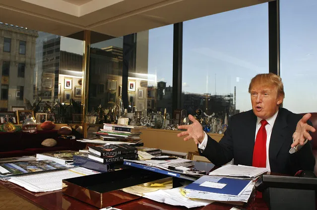 Donald Trump answers questions during an interview about his new book with co-author Robert Kiyosaki, “Why We Want You to Be Rich”, at his office in New York City October 9, 2006. (Photo by Lucas Jackson/Reuters)